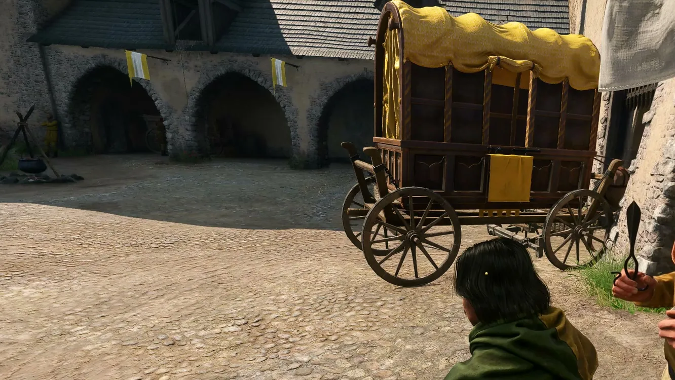 Captura del juego: el barbero de Sotodal, con sus tijeras en la mano, trabajando con un cliente sentado en su silla en el patio del castillo.