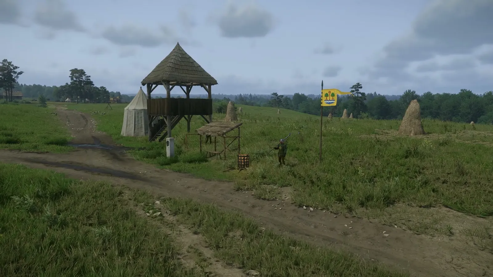 Captura del juego: el portazgo del camino de Peñalba, con su guardia, la torre de vigía y la hoguera.